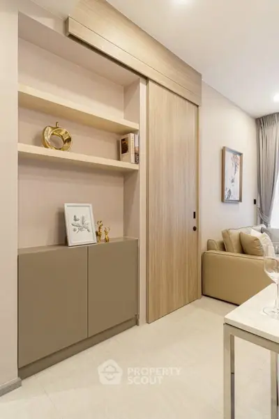 Modern living room with stylish shelving and cozy seating area