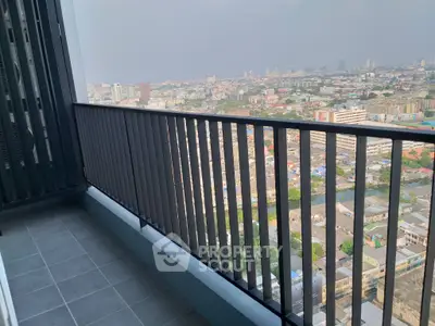 Stunning high-rise balcony with panoramic city views, perfect for urban living.