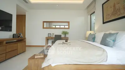 Luxurious bedroom with modern decor and elegant furnishings