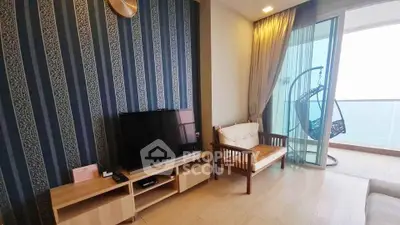 Stylish living room with modern decor and ocean view balcony