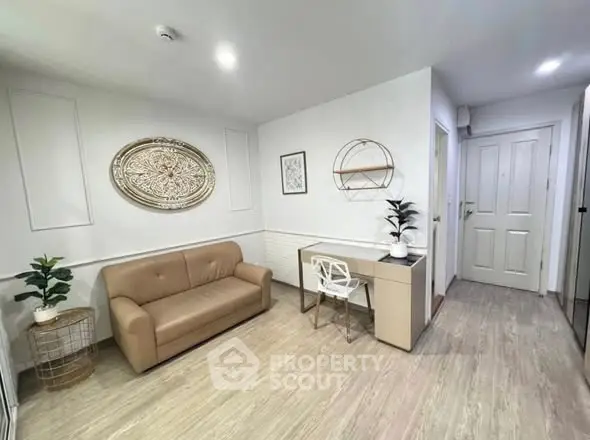 Modern living room with stylish decor and cozy seating area.