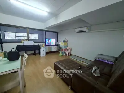 Cozy living room with modern furniture and air conditioning
