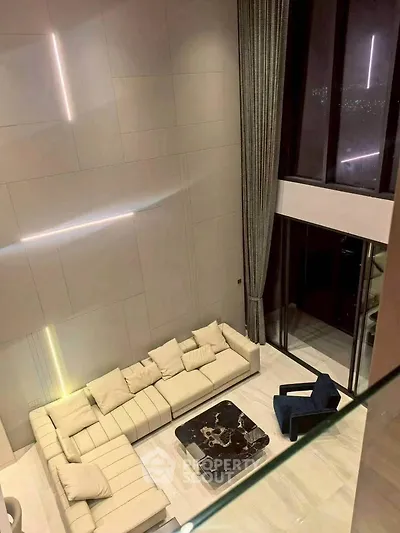 Luxurious modern living room with high ceilings and elegant decor