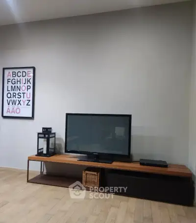 Modern living room with sleek TV stand and minimalist decor