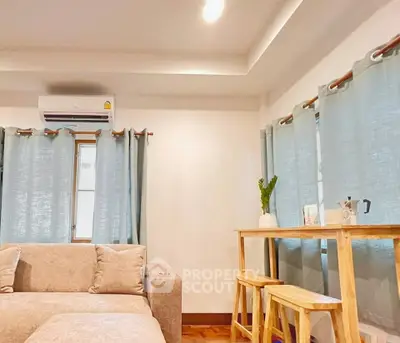 Cozy living room with modern decor and natural light