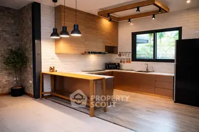 Modern kitchen with sleek wooden cabinets and open layout design