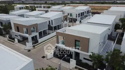 Modern residential complex with contemporary architecture and spacious layout in a serene neighborhood.