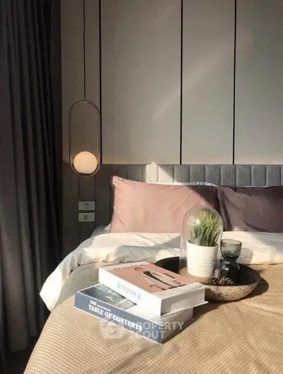 Cozy bedroom with stylish decor and natural light