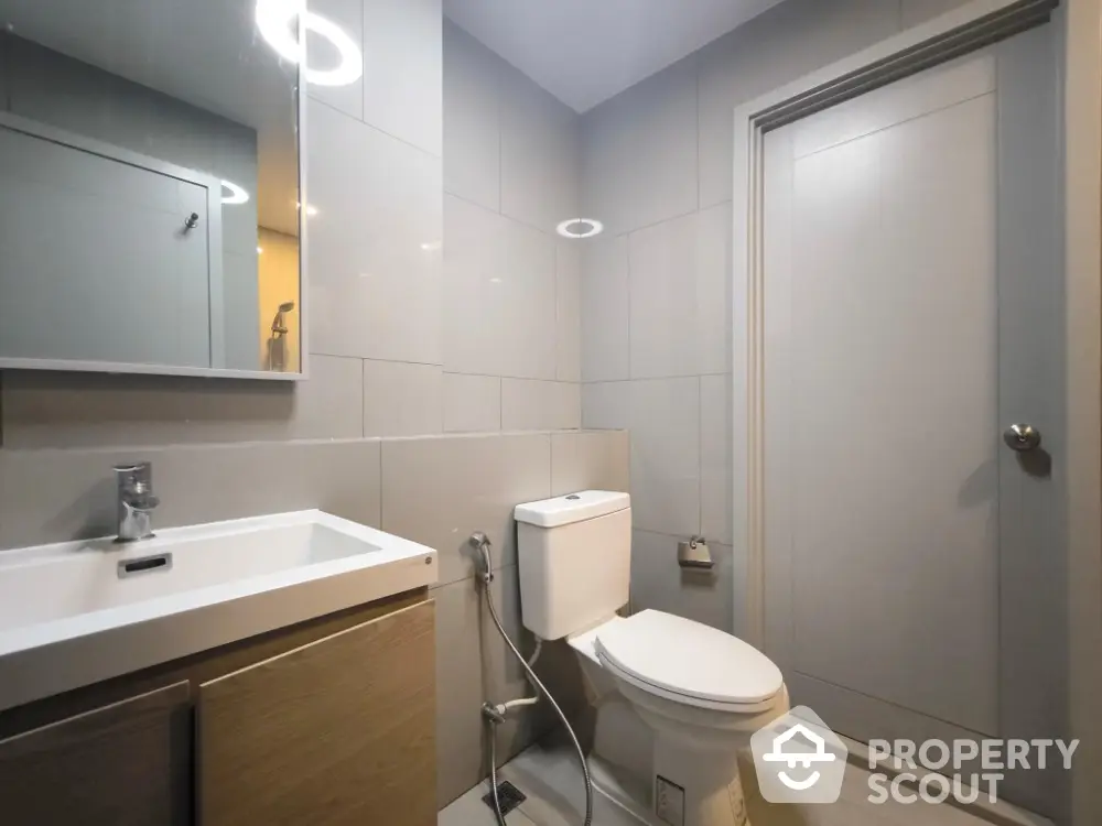 Modern bathroom with sleek fixtures and neutral tones