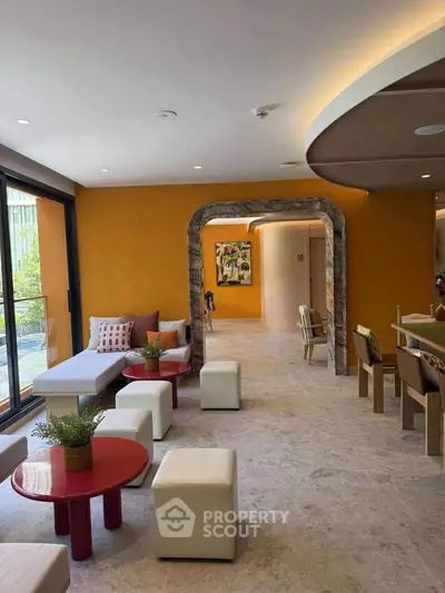Modern living room with vibrant decor and natural light