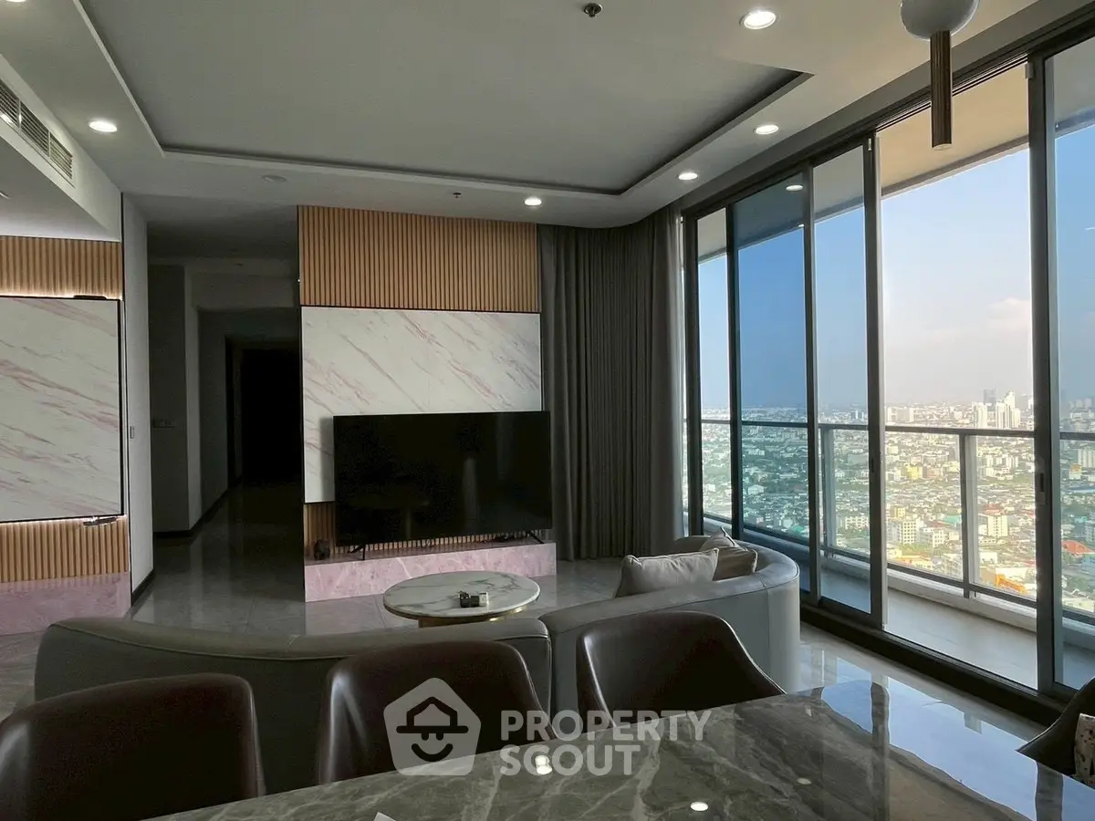 Luxurious living room with panoramic city view and modern decor