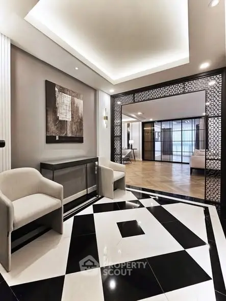 Elegant modern lobby with stylish decor and geometric flooring