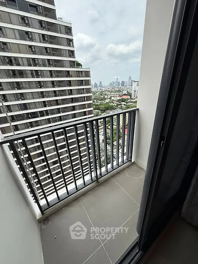 Modern high-rise balcony with stunning cityscape view