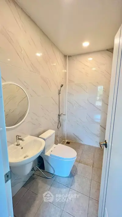 Modern bathroom with sleek fixtures and elegant tile design