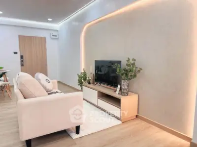 Modern living room with stylish lighting and cozy seating area