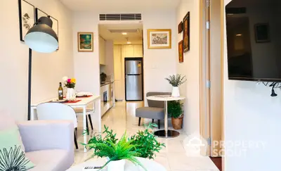 Bright and inviting modern apartment interior with a sleek kitchen, cozy dining area, and tasteful decorations, perfect for urban living.