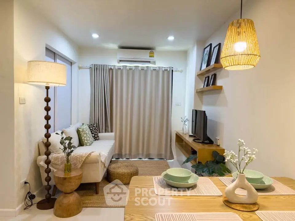 Charming living room with cozy decor, stylish furniture, and warm lighting perfect for relaxation.