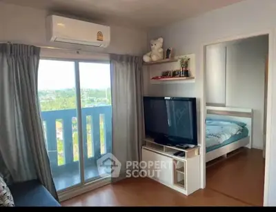Cozy living room with balcony view and modern decor in urban apartment