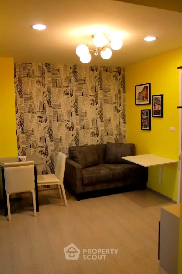 Stylish living room with modern decor and vibrant yellow walls