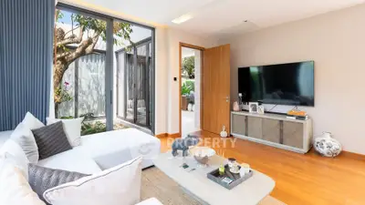 Modern living room with large windows and stylish decor