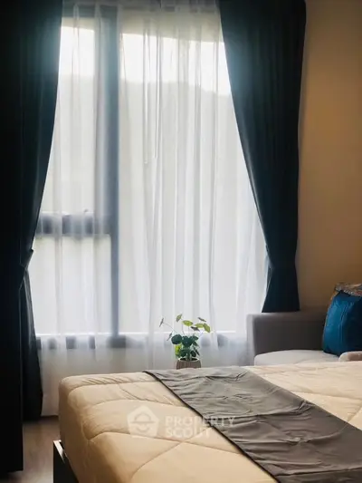 Cozy bedroom with elegant curtains and natural light