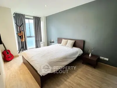 Modern bedroom with stylish decor and natural light