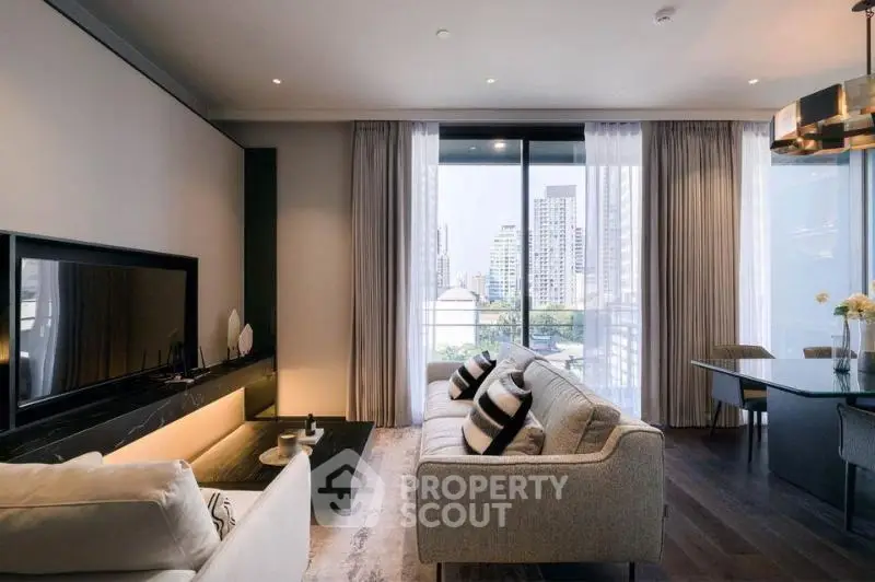 Luxurious modern living room with city view, elegant decor, and ample natural light.