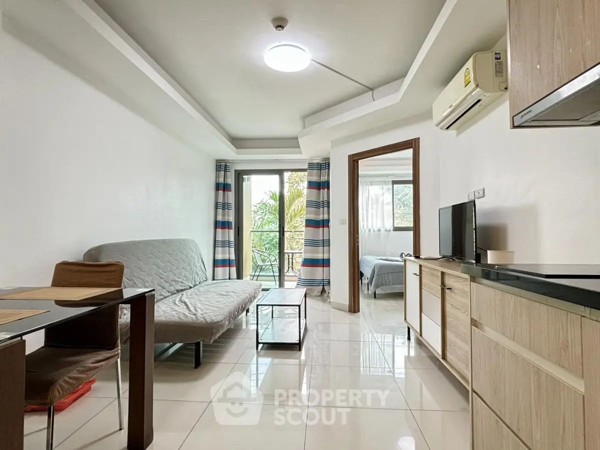 Modern living room with open layout and balcony view