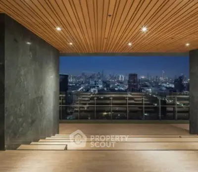 Luxurious rooftop with stunning city skyline view, perfect for entertaining and relaxation.