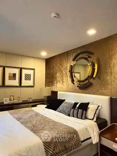 Luxurious bedroom with modern decor and stylish mirror accent