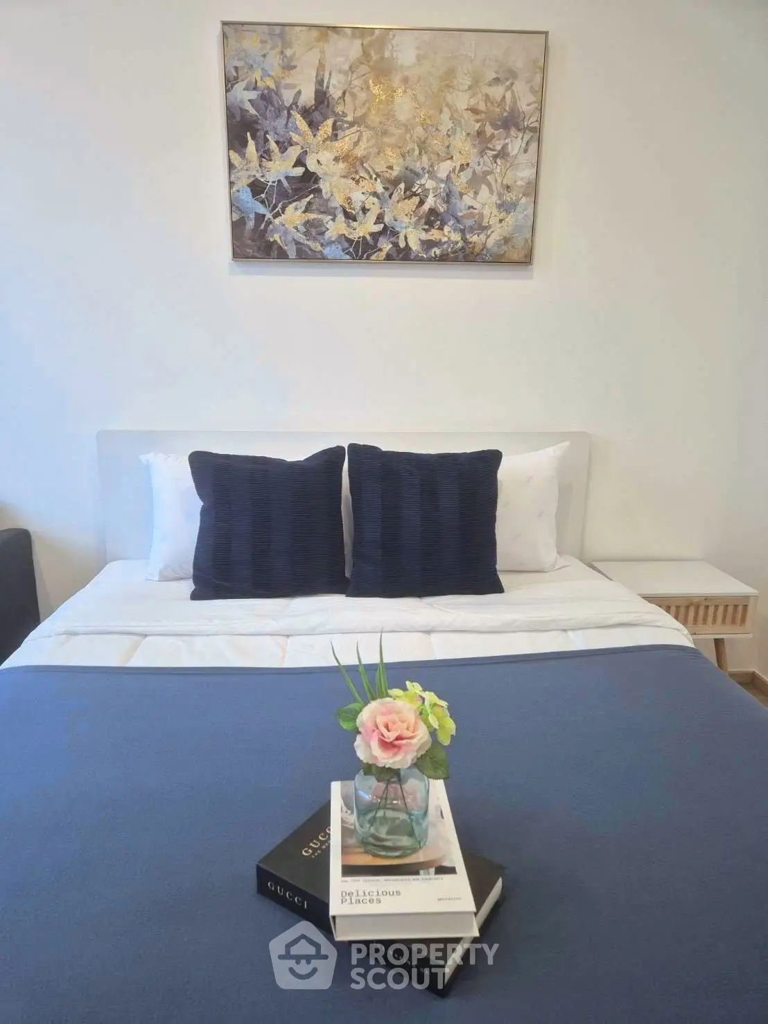 Elegant bedroom with stylish decor and cozy bedding, perfect for relaxation.
