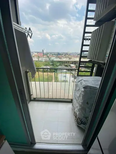 Charming balcony with stunning city view, perfect for relaxation and enjoying the skyline.