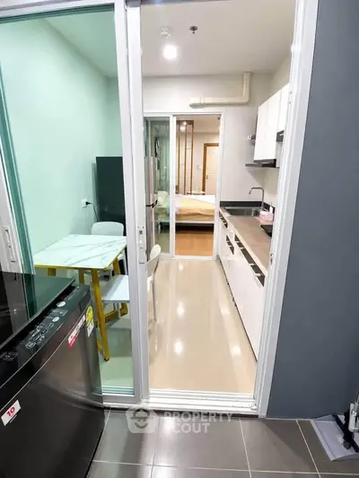 Modern apartment kitchen with sleek design and open layout