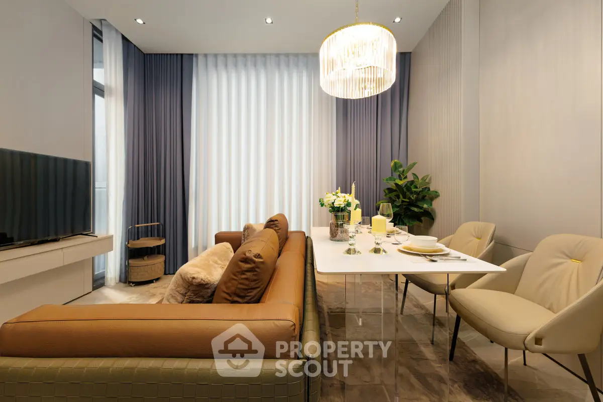 Modern living room with elegant dining area and stylish decor