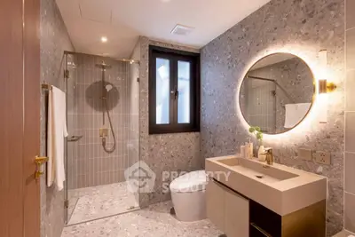 Luxurious modern bathroom with elegant fixtures and stylish lighting