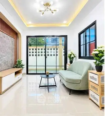 Modern living room with sleek design, large windows, and stylish furniture in a bright, inviting space.