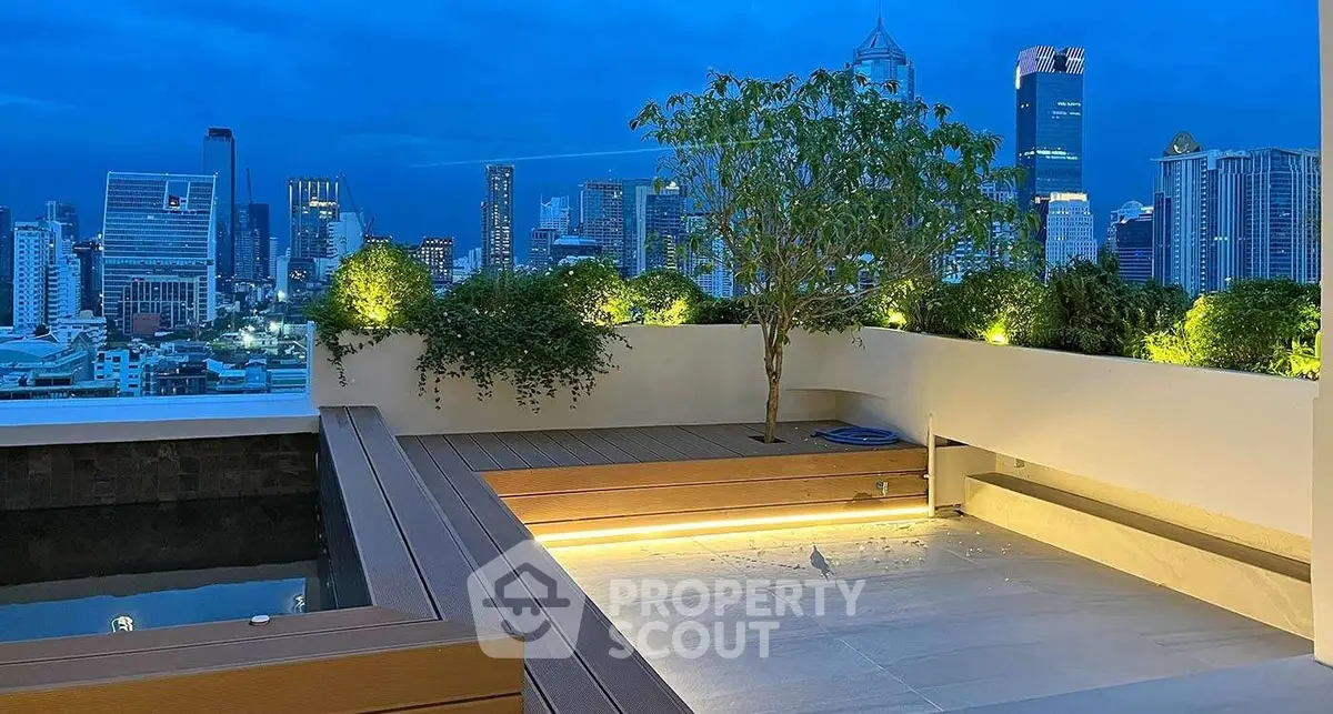 Stunning rooftop terrace with city skyline view and ambient lighting