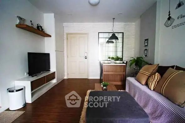 Cozy living room with modern decor and stylish furniture, perfect for relaxation and entertainment.