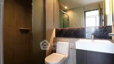 Modern bathroom with sleek design and spacious shower area