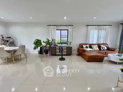 Spacious modern living room with elegant decor and natural light