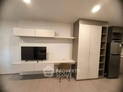 Modern living room with sleek TV unit and stylish storage solutions
