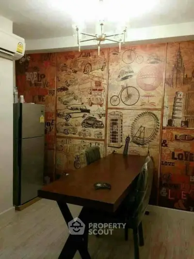 Stylish dining area with vintage-themed wall art and modern furniture, perfect for urban living.