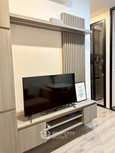 Modern living room with sleek TV stand and stylish decor