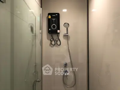 Modern bathroom shower with sleek design and high-quality fixtures in a contemporary home.