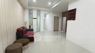 Spacious modern living room with stylish furniture and elegant decor