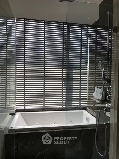 Luxurious bathroom with modern bathtub and sleek shower design