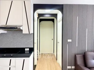 Modern apartment interior with sleek kitchen and stylish hallway design