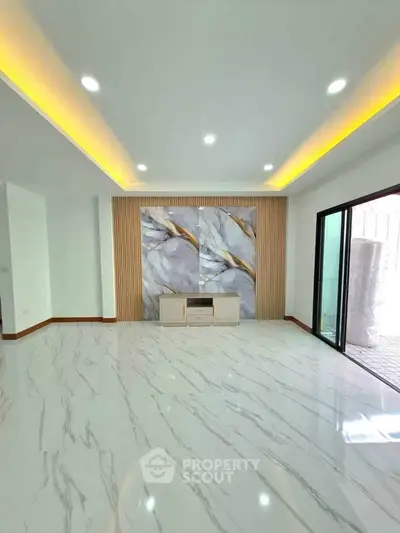 Luxurious modern living room with marble flooring and elegant lighting