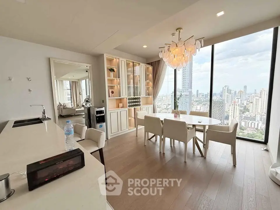 Luxurious modern living room with panoramic city views and elegant dining area.