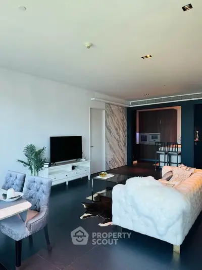 Luxurious modern living room with elegant decor and open kitchen layout